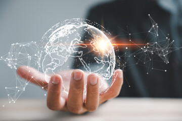 Global Business Intelligence, A businessman uses a digital interface to analyze data, unlocking insights for strategic decision-making. world map composition signifies international reach of business.