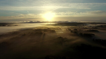 Fototapeta na wymiar Aerial View Of Fog Mist Over Rural Countryside
