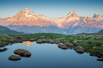Panorama of Mt. Schreckhorn and Wetterhorn. Popular tourist attraction. Dramatic and picturesque scene. Place location Bachalpsee in the Swiss Alps Bernese Oberland, Grindelwald, Europe Flowing stream