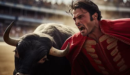 Zelfklevend Fotobehang Bullfight in Spain. Spanish bullfighter in the bullfighting arena. Spanish bullfighting bull and matador © Sattawat
