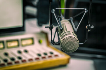 Professional microphone and sound mixer in radio station studio