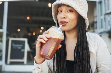 Woman, smoothie and portrait outdoor at a restaurant and drink from cafe with a smile. Milkshake,...