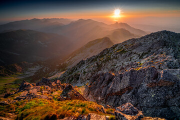 Fantastic evening at Świnica in the High Tatras. Sunset in high mountains, Poland, Slovakia. Delicate light falling on the top
