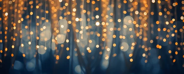 Poster holiday illumination and decoration concept - christmas garland bokeh lights over dark blue background © Michael