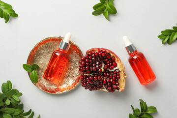 Self care and skincare products concept - pomegranate cosmetics