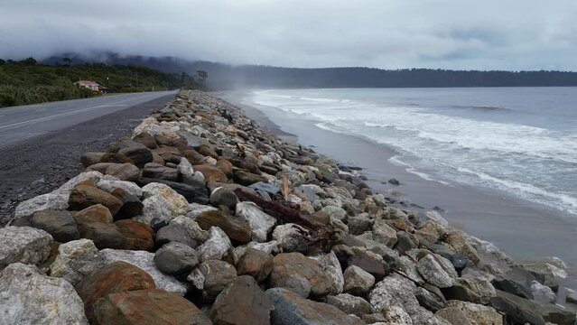 Bruce Bay, New Zealand: Aerial drone footage of the beach and coast of Bruce Bay in the New Zealand south island wild West coast on a rainy day