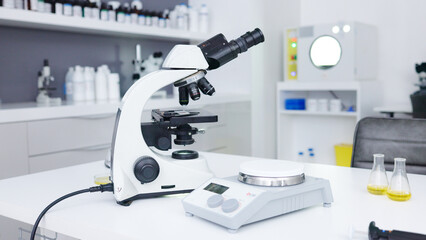 Backgrounds, science scale and microscope in laboratory for innovation, medical research or investigation of dna, particles or medicine. Biotechnology tools, chemistry or empty for health development