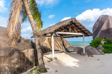 Wooden gazebo by the sea in Anse Source d'Argent beach