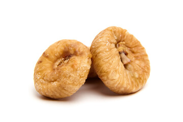 Dried fig fruits isolated on white. Three sweet sundried figs