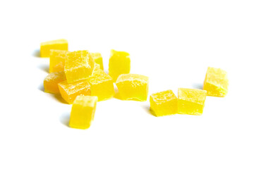 Diced mango dried fruits isolated on white background. Dehydrated mango chips dices