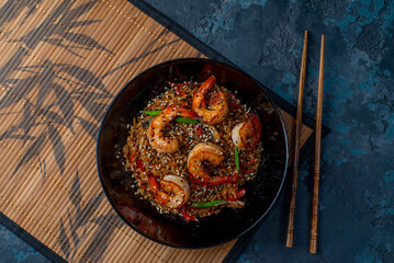 Asian fried wok rice with seafood - 648085375