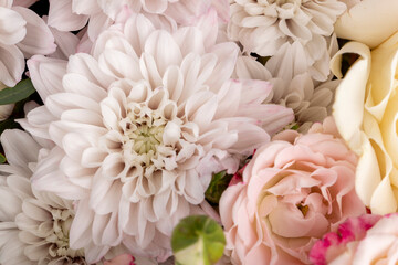 a bouquet with different types of flowers in close-up