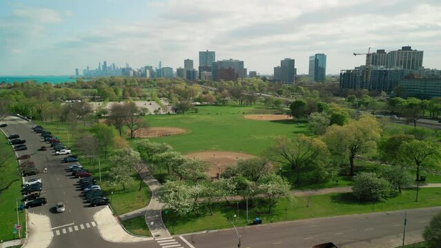 Aerial shot of Baseball Players Playing During Match On A Sunny Day. Wide shot
