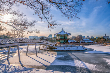 Gyeongbokgung Palace in winter covered with snow in Seoul, South Korea.
Tourist attractions that are popular with tourists and photographers. - obrazy, fototapety, plakaty