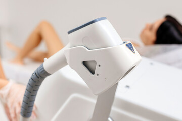 Hair removal-depilation. A young woman undergoes a laser hair removal procedure, close-up....