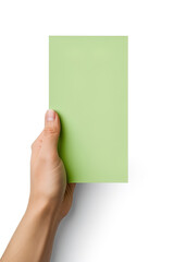 A human hand holding a blank sheet of green paper or card isolated on a white background