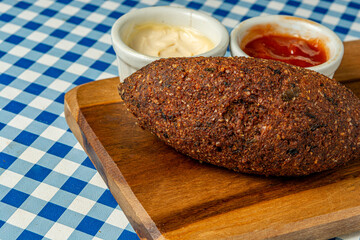 kibe, traditional Brazilian fried food. typical fried snack food stuffed with cheese