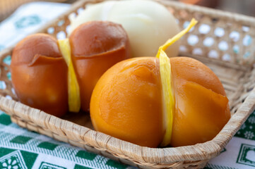 Italian semi hard handmade smoked scamorza cheese, from cow milk from Apulia or Calabria regions close up