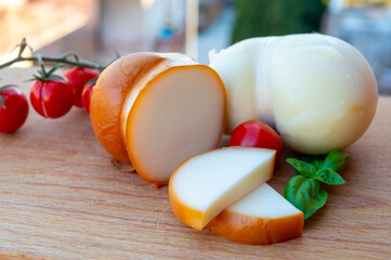 Italian semi hard handmade smoked scamorza cheese, from cow milk from Apulia or Calabria regions...