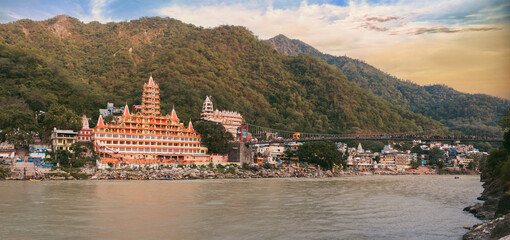 View of Ganga river embankment, Lakshman Jhula bridge and Tera Manzil Temple, Trimbakeshwar in...