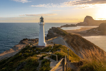 A lighthouse on beautiful landscape at sunset, Castlepoint, New Zealand