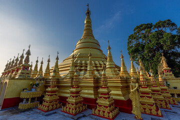 Fototapeta premium background of the pagoda(Wat Suwan Khiri),Phutthasuwan Chedi, built for people or tourists to come to make merit and take pictures without having to seek permission while traveling in Ranong,Thailand.