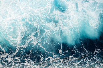 Top View To Ocean Waves. Blue Water Background. Aerial View Of Sea Waves. Copy Space. Natural Background