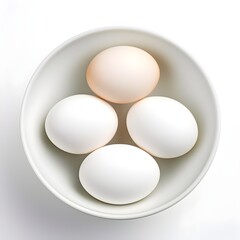 A simple yet essential culinary scene with three fresh eggs nestled in a bowl, ready for cooking.