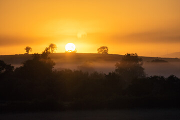 Sunrise in Ireland with light streaks