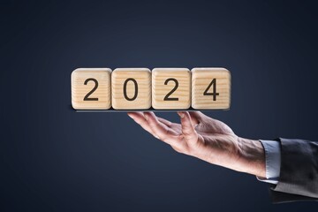 Set of wooden cube blocks in business hand