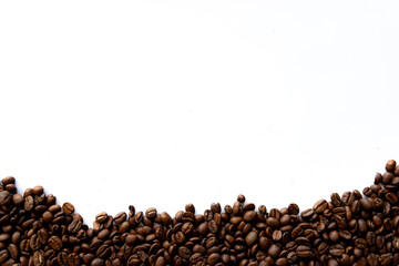 Roasted coffee beans white background.