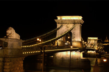Scenic night light landscape of Budapest. Illuminated Chain Bridge over Danube river. Close-up view. Notable landmark in Budapest. Travel and tourism concept