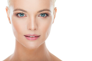 Fototapeta premium Blonde Caucasian woman with perfect skin and blonde hair with a white background