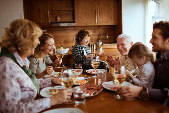 Multigenerational Family Having Lunch Together At Home