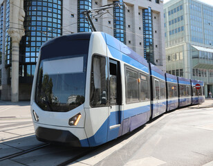 modern tram on rails for transporting people in the metropolis