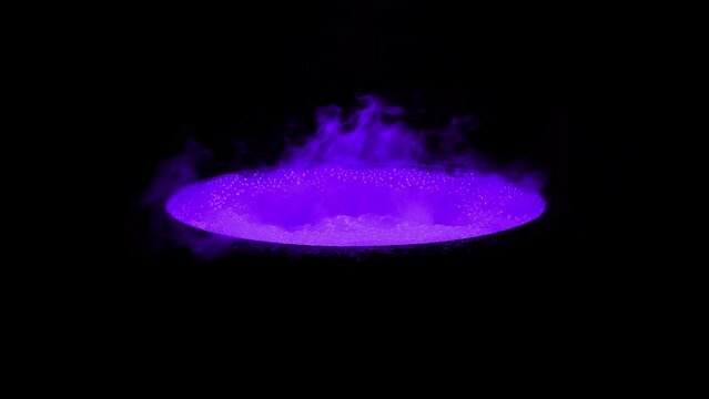 Purple Bubbling Vat In The Dark
