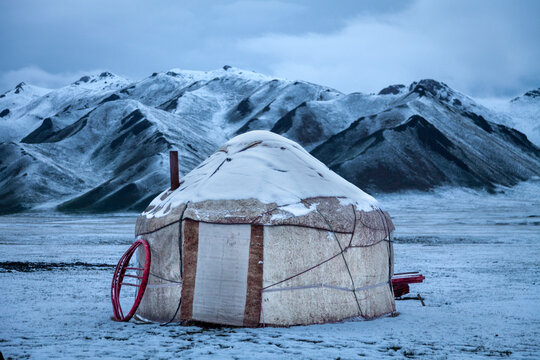 nomadic yurt in winter in the mountains