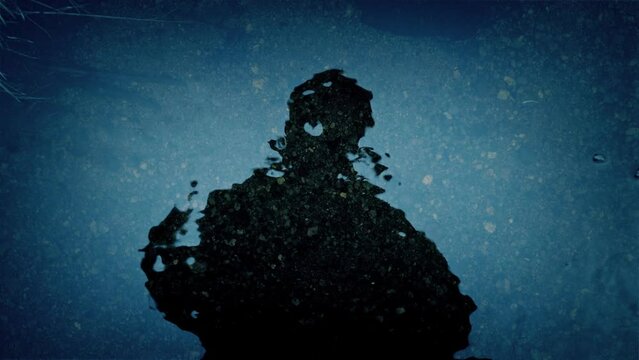 Scary Reflection Of A Person By The River