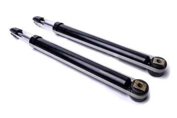 Car shock absorbers on white