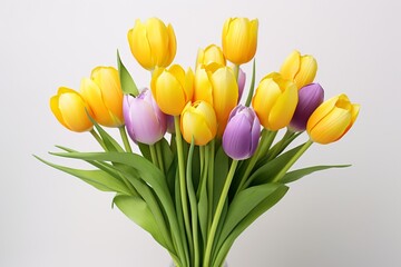 A bouquet of realistic yellow and purple tulips