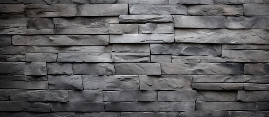 Texture of stone tiles on a gray wall background