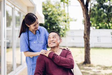 Caregiver nurse take care a Senior patient outside home. Nurse helping senior people