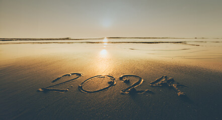 Happy New Year 2024 ocean sunrise on the beach shore concept - obrazy, fototapety, plakaty