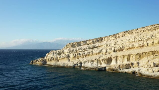 The nooks and crannies in the rocky and limestone cliffs, in Europe, in Greece, in Crete, in Matala, By the Mediterranean Sea, in summer, on a sunny day.&nbsp;