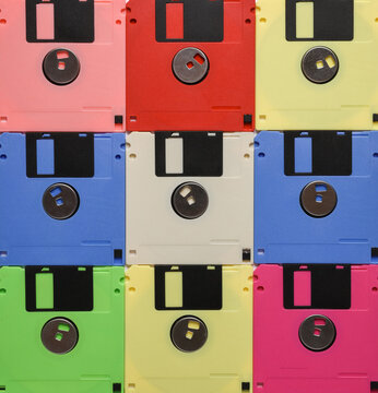 Background of many colored retro floppy disks