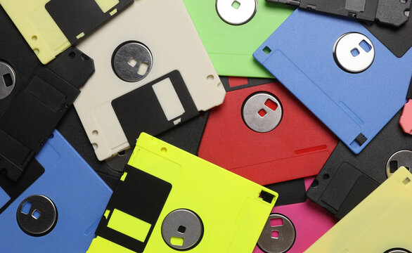 Many colored floppy disks close-up