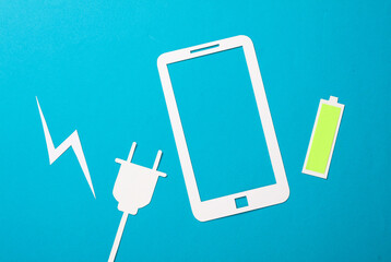 Paper-cut smartphone icon with fully charged battery and electric plug on bliue background