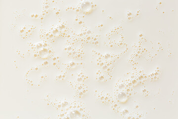Macro milk texture,White surface of milk and bubbles and ripples from above birds eye view