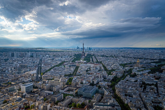 Aerial view over Paris under a dramatic sky - travel photography in Paris France