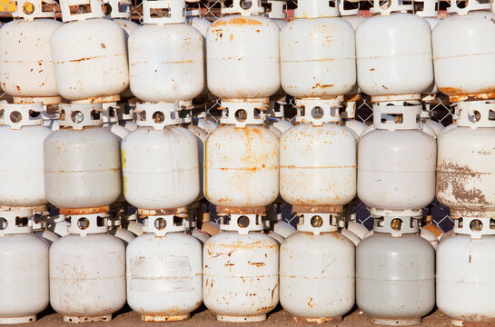 Used propane tanks piled up for recycling; Edmonton, alberta, canada